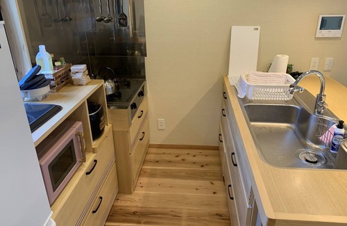 Genka House | A house in the forest, with a large garden for barbecue and a nearby river to play as much as you like.