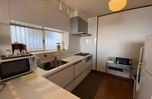 Kitakyushu House | A house with a night view and a healing wood stove - HH/Kitakyushu Fukuoka