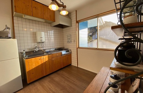 Kitakyushu House | A house with a night view and a healing wood stove - HH/Kitakyushu Fukuoka