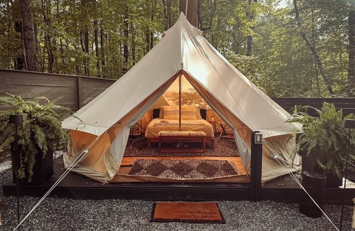 Denver House | A luxurious glamping tent nestled in the trees.