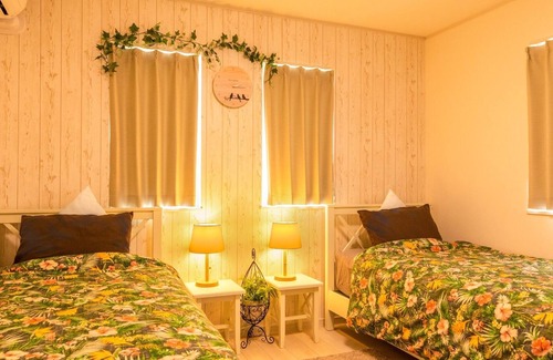 Maeda House | A modern house with a simple and calm atmosphere b / Kunigami-gun Okinawa