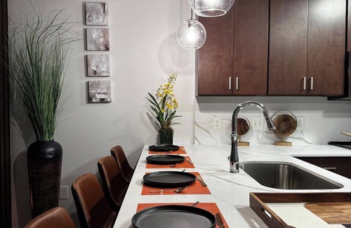 Midtown Apartment | A Place of Peace: Discover serene comfort in a peaceful retreat! This centrally located property provides easy access to top corporations, popular attractions, stadiums, & dining hotspots.