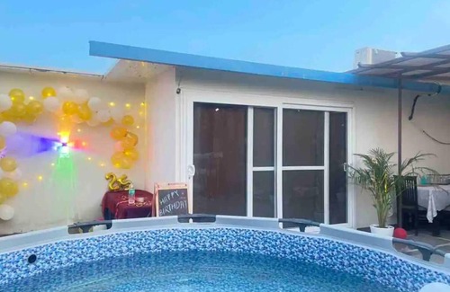 New Delhi House | A Roof to Remember. Swiss cottage & private pooln