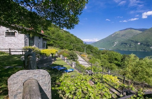 Fiumelatte Villa | A THREE-STORY VILLA OVERLOOKING THE VEZIO CASTLE &LAKE LUGANO,ITALIAN SIDE