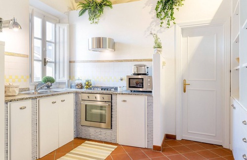 Lucca Historical Center Apartment | A Toproof Penthouse Apartment with Elevator and Private Garden Inside the Walls
