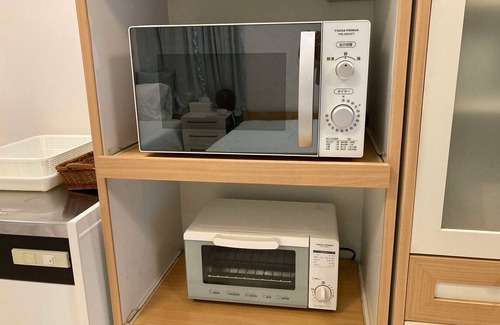 Hamada House | A triple room with a spectacular oceanfront view sunset right in front of you and plenty of amenit/Hamada Shimane