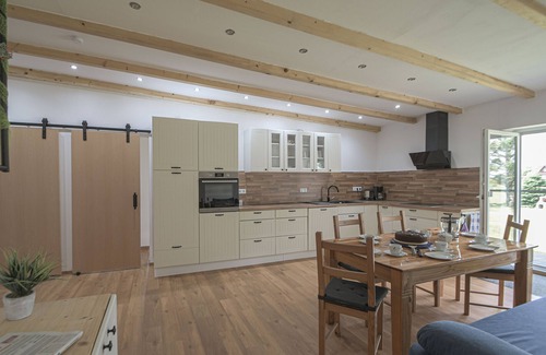 Brookmerland House | A vacation home to feel at home in. Our newly renovated and just completed "Ferienhaus Upgant" is modern and stylishly furnished. The 110 square meter living space is located entirely on the first floor and offers you open, modern living.