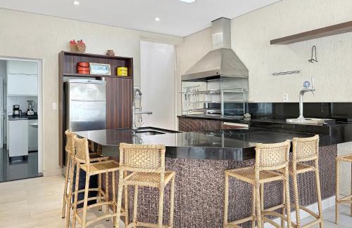 Enseada House | AC - Piscina - 1 Suite com banheiro - 200m do mar