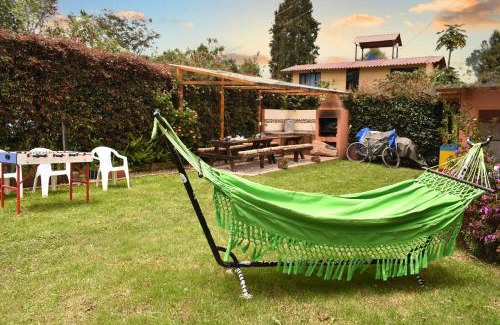 Tabio House | Acogedora Cabaña En Tabio con zonas verdes y BBQ