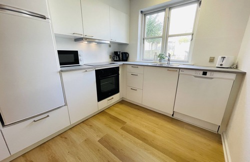 Hjørring Apartment | aday - Central Terrace Apartment in Hjørring
