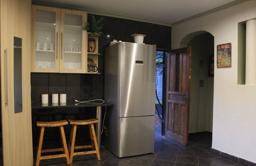 Germiston House | Afro Rasta Kumusha is a home away from home with a loving Rasta Family. Peace!