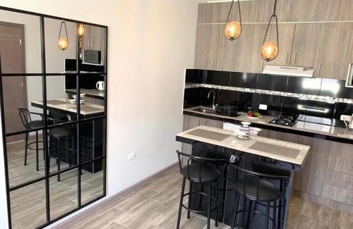 Banos de Agua Santa Apartment | AHAVAH SUITES