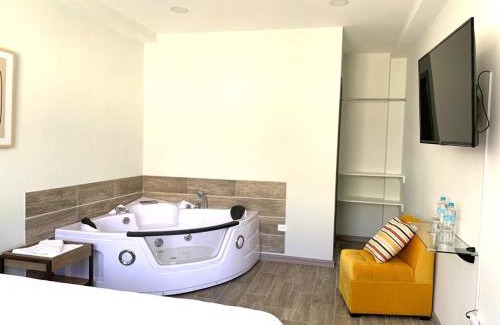 Banos de Agua Santa Apartment | AHAVAH SUITES