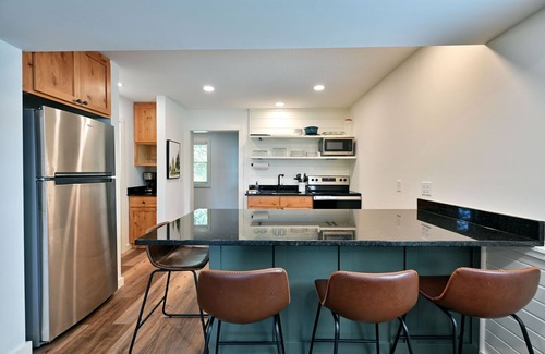 Webb Lake Condo | All 4 lakefront condos! Private beach, dock, sauna, club room, decks.