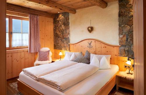 Hundsdorfl Ski Chalet | Almdorf Flachau - Luxus Hüttenurlaub