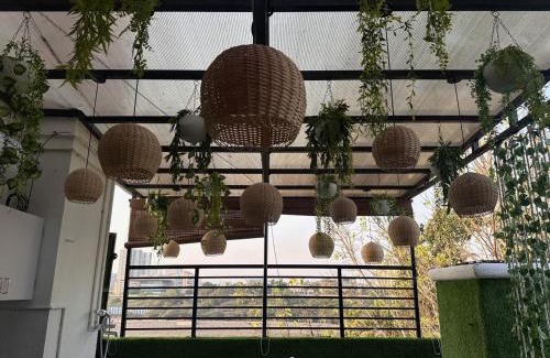 Koregaon Park Apartment | Aloha:Pvt BR with Huge Terrace Jacuzzi Lake view