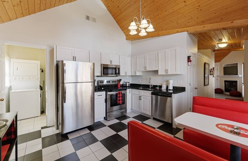 Helen House | Alpine River Suites #504 - Coca-Cola-Themed River Condo in Downtown Helen