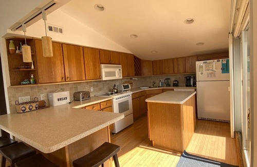 Harvey Cedars House | AMAZING LAGOON FRONT HOUSE WITH HEATED POOL AND HOT TUB IN HARVEY CEDARS, LBI