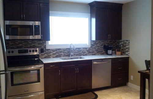 West Hillhurst House | Amazing Location ! Close to Down town, FMC, ACH, UofC , Complete Reno , Quiet