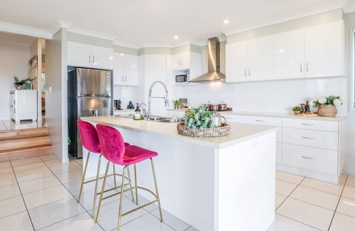 Agnes Water House | AMORE HOLIDAY HOUSE - Stunning family property capturing sea breezes & ocean views.