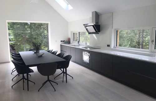 Crianlarich Ski Chalet | An Caisteal Lodge with cascading waterfall view