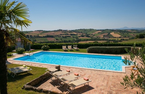 Corinaldo House | Ancient farmhouse with swimming pool nestled in the hills of Corinaldo