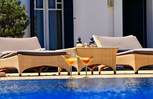 Paleopolis Villa | Andros Cyclades, private tennis & basketball courts,horses for riding