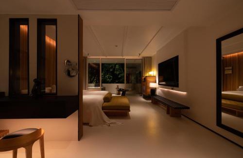 Jinghong Hotel | Anlai Rainforest Wild Luxury Hotel