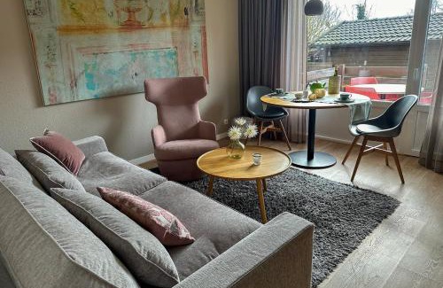 Spiekeroog Apartment | Antares Spiekerooger Gästehaus-Sonnengartenterrasse Süd - Wohnung 3