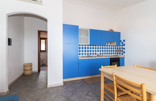 Trinita d'Agultu Apartment | Apartment 'Con Piscina 14' with Sea View, Wi-Fi and Air Conditioning