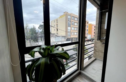 Campin Apartment | Aparta Suite Movistar Arena - Moderno, Central y Seguro. Terraza y bbq