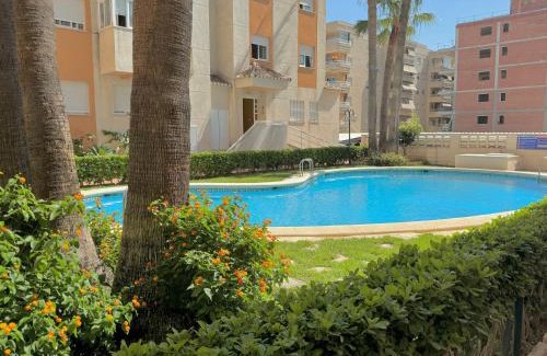 Daimuz Apartment | .Apartamento 1a linea de playa + piscina + parking DAIMUS