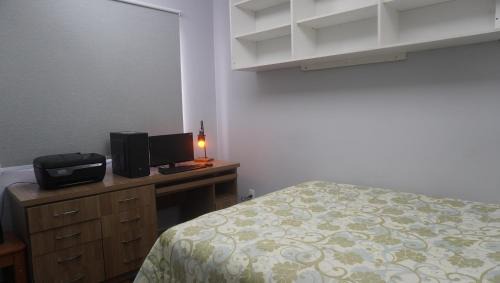 Centro Apartment | Apartamento central próximo ao Shopping Palladium com garagem coberta