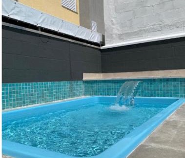 Centro Apartment | Apartamento novo região central de Ubatuba, com churrasqueira e varanda, 2 vagas - Residencial Jathy NATAL E ANO NOVO LIVRE