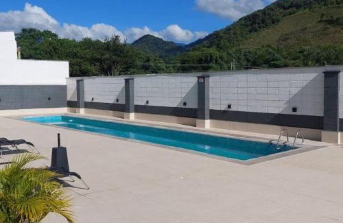 Centro Apartment | Apartamento novo região central de Ubatuba, com churrasqueira e varanda, 2 vagas - Residencial Jathy NATAL E ANO NOVO LIVRE