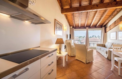 San Felice del Benaco Apartment | Apartment 'Antica Torre Byron' with Shared Pool, Wi-Fi and Air Conditioning