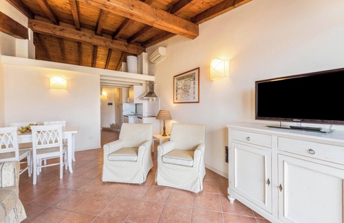 San Felice del Benaco Apartment | Apartment 'Antica Torre Byron' with Shared Pool, Wi-Fi and Air Conditioning