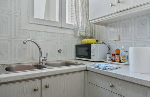 Athens Apartment | Apartment 'Family, Enjoy Athens, Apt 90 Cm' with Private Garden, Wi-Fi and Air Conditioning