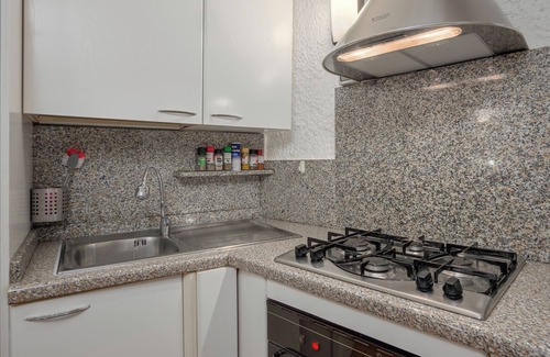 Tiriddo Apartment | Apartment Ginepri 50m from the beach, with Garden & Wi-Fi