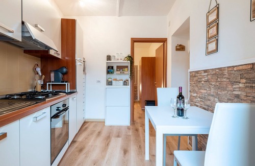 Loceri Apartment | Apartment 'Il Cinghiale Bianco' with Balcony, Wi-Fi and Air Conditioning