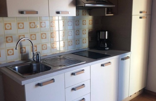 Castelletto Apartment | Apartment in Brenzone Sul Garda with Spacious Garden and Mountain View