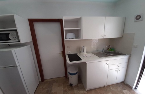 Dafnata Apartment | Apartment in Mpenitses with Sea Views & Pool