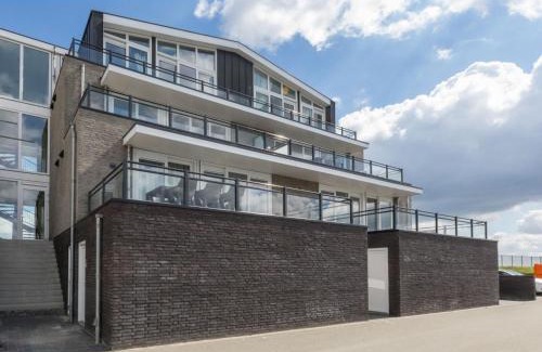 Sint-Annaland Apartment | Apartment in Sint-Annaland with Water Views