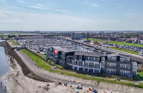 Sint-Annaland Apartment | Apartment in Sint-Annaland with Water Views