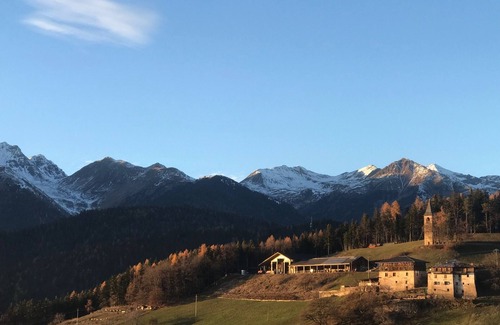 Revo Apartment | Apartment in the mountains, view of the Maddalene chain -Trentino-Alto Adige CIN