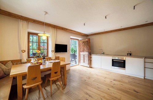 San Leonardo in Passiria Apartment | Apartment “Schildhofsuite” in “Schildhof Ebion” with Mountain View & Garden