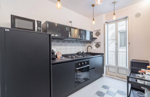Santa Lucia Apartment | Apartment 'Mille E Una Notte - Suoni D'Acqua' with Private Terrace, Wi-Fi and Air Conditioning