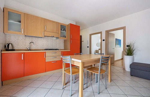 Torbole sul Garda Apartment | Apartment 'N 3 Appartamento Arancio' with Mountain View, Shared Garden and Balcony