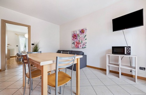 Torbole sul Garda Apartment | Apartment 'N 3 Appartamento Arancio' with Mountain View, Shared Garden and Balcony