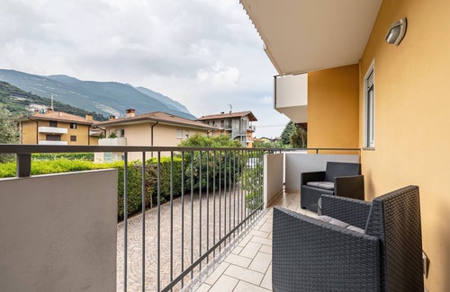 Torbole sul Garda Apartment | Apartment 'N 3 Appartamento Arancio' with Mountain View, Shared Garden and Balcony
